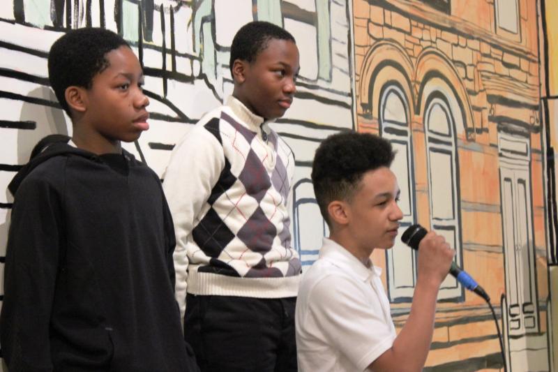 Students attend the grand opening of the District 17 Family Resource Center family center