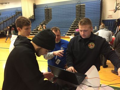 Students using a computer.