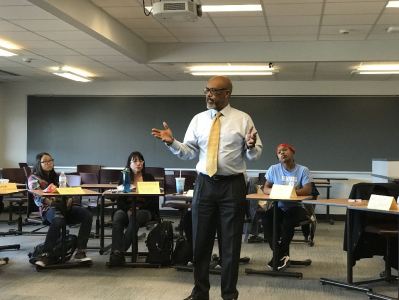 Regent Young speaking with TOC II students at SUNY Oswego