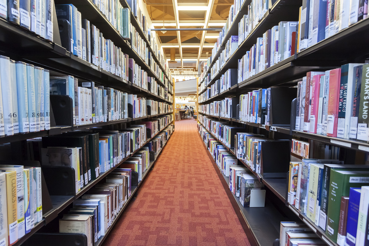 Shelves of books in library