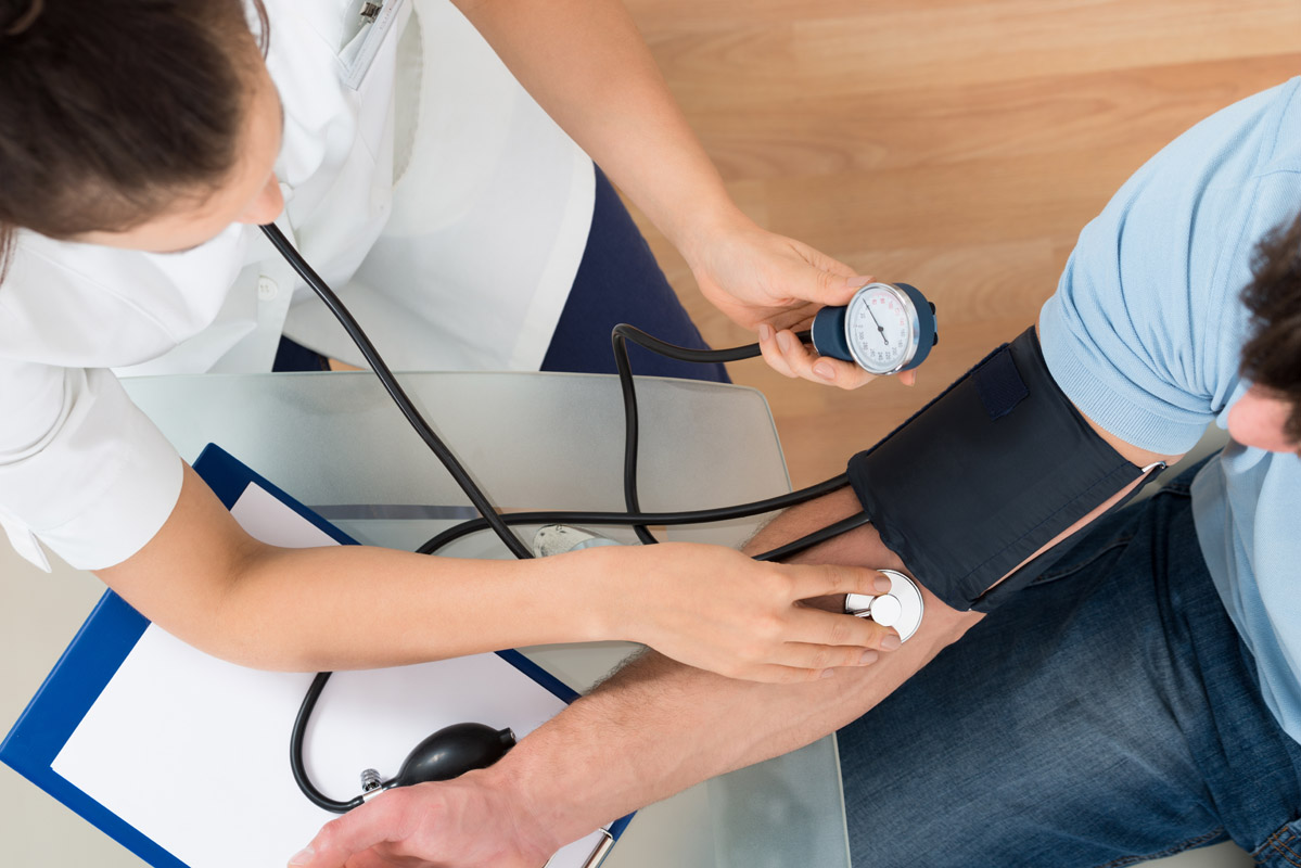 nurse taking blood pressure