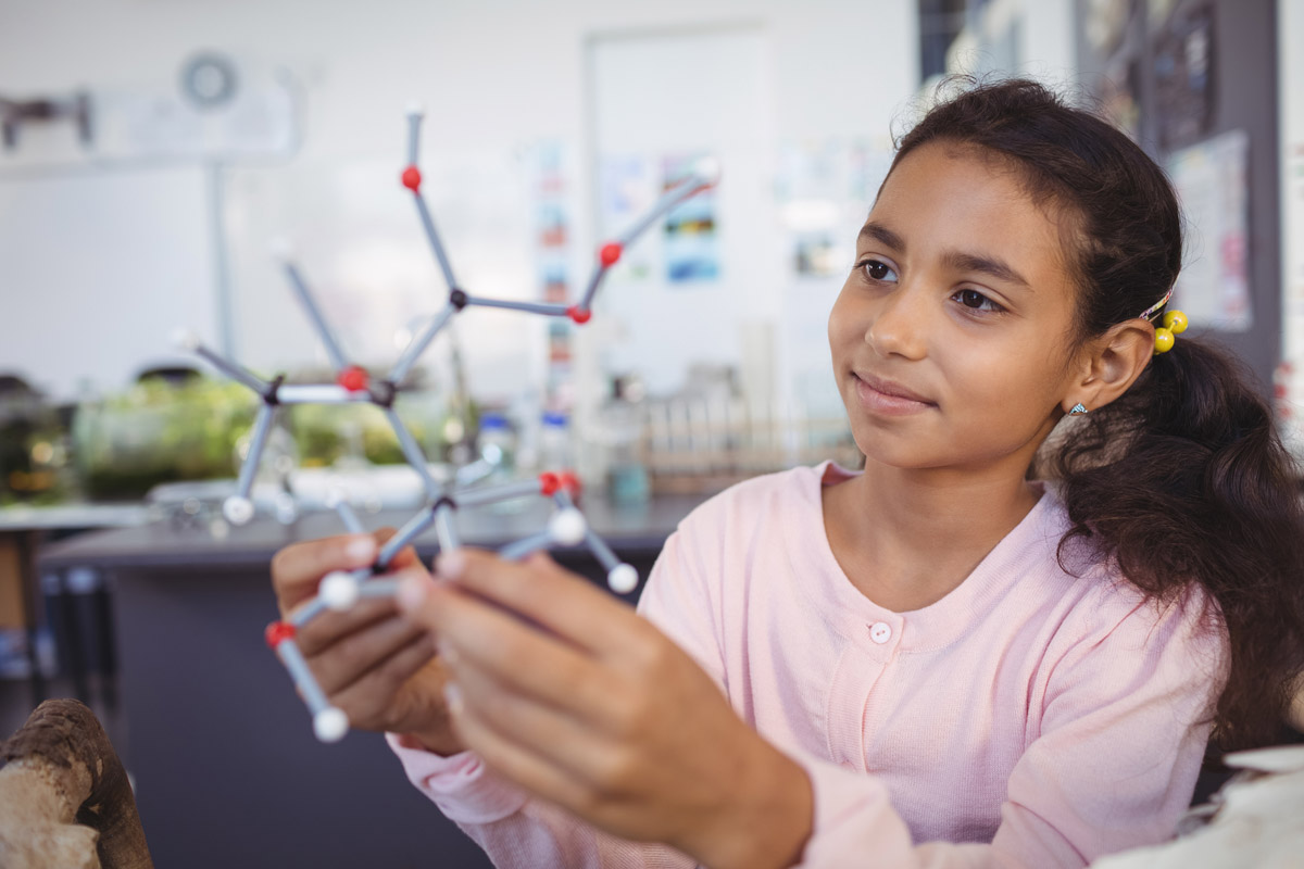 Student engaging in science activity.