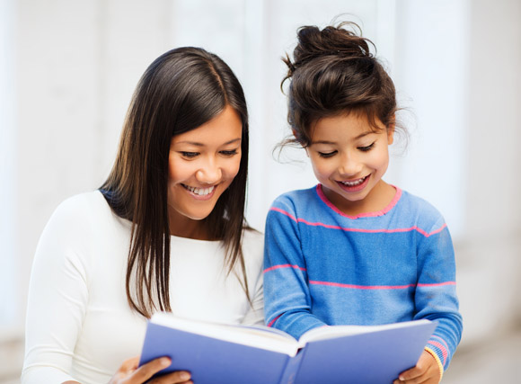 Parent and child reading book