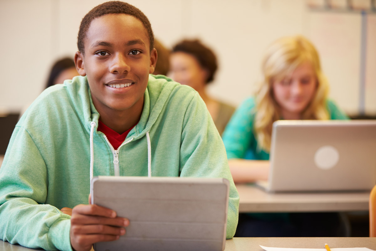 High school students with computers