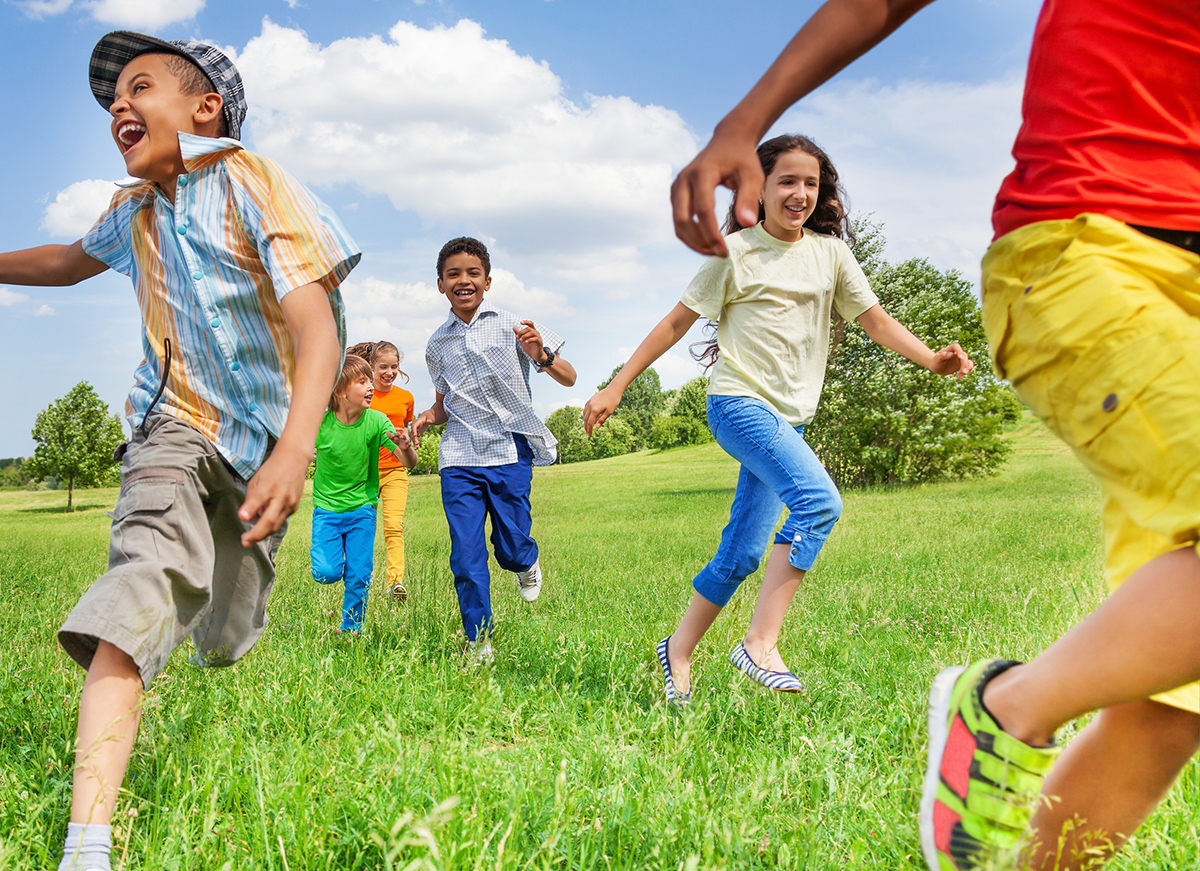 Group of kids running outside