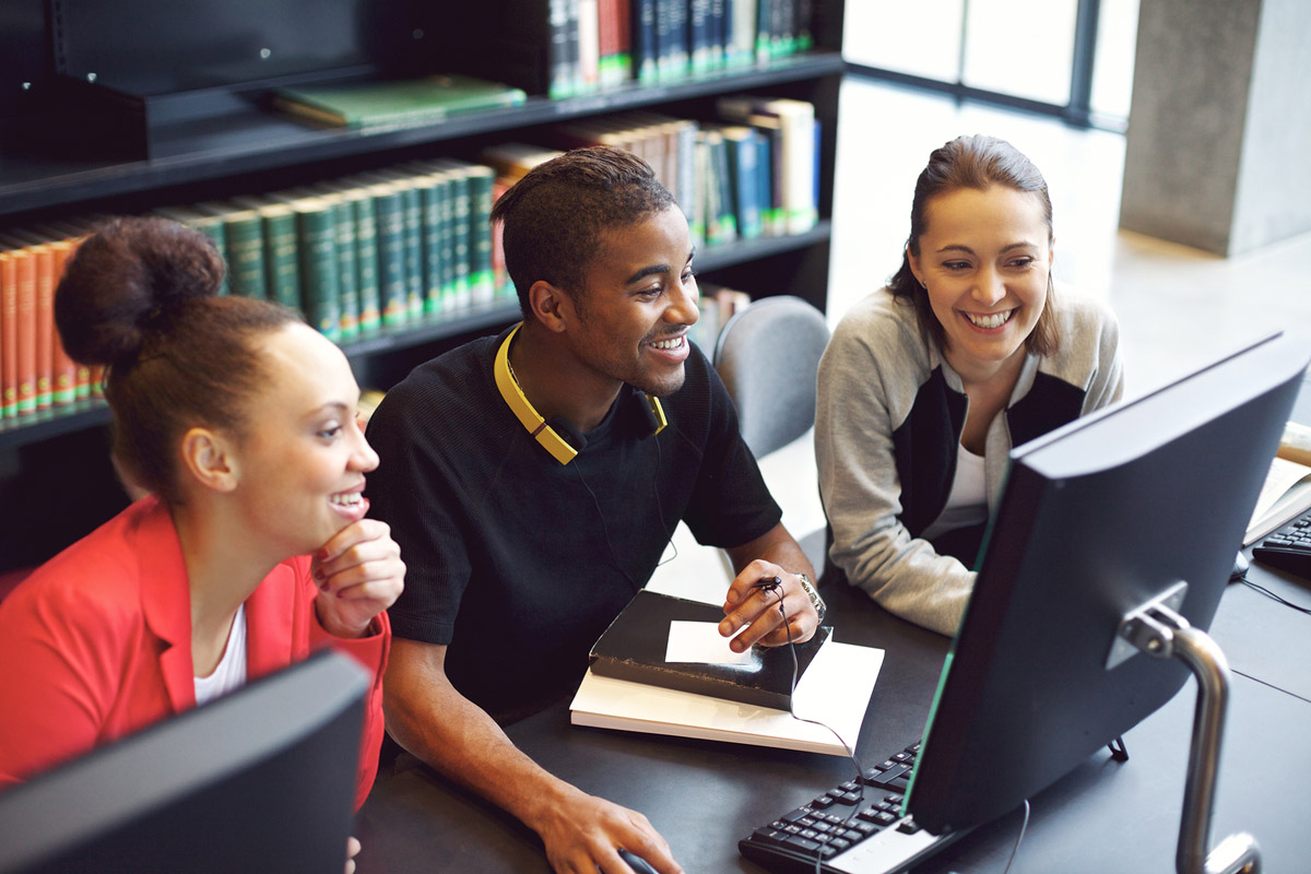 Students working together using a computer