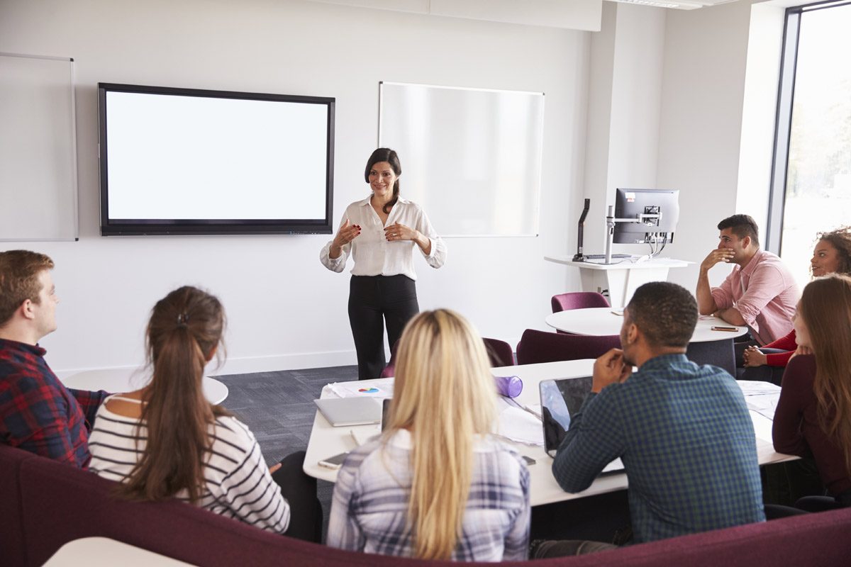 Teacher lecturing students