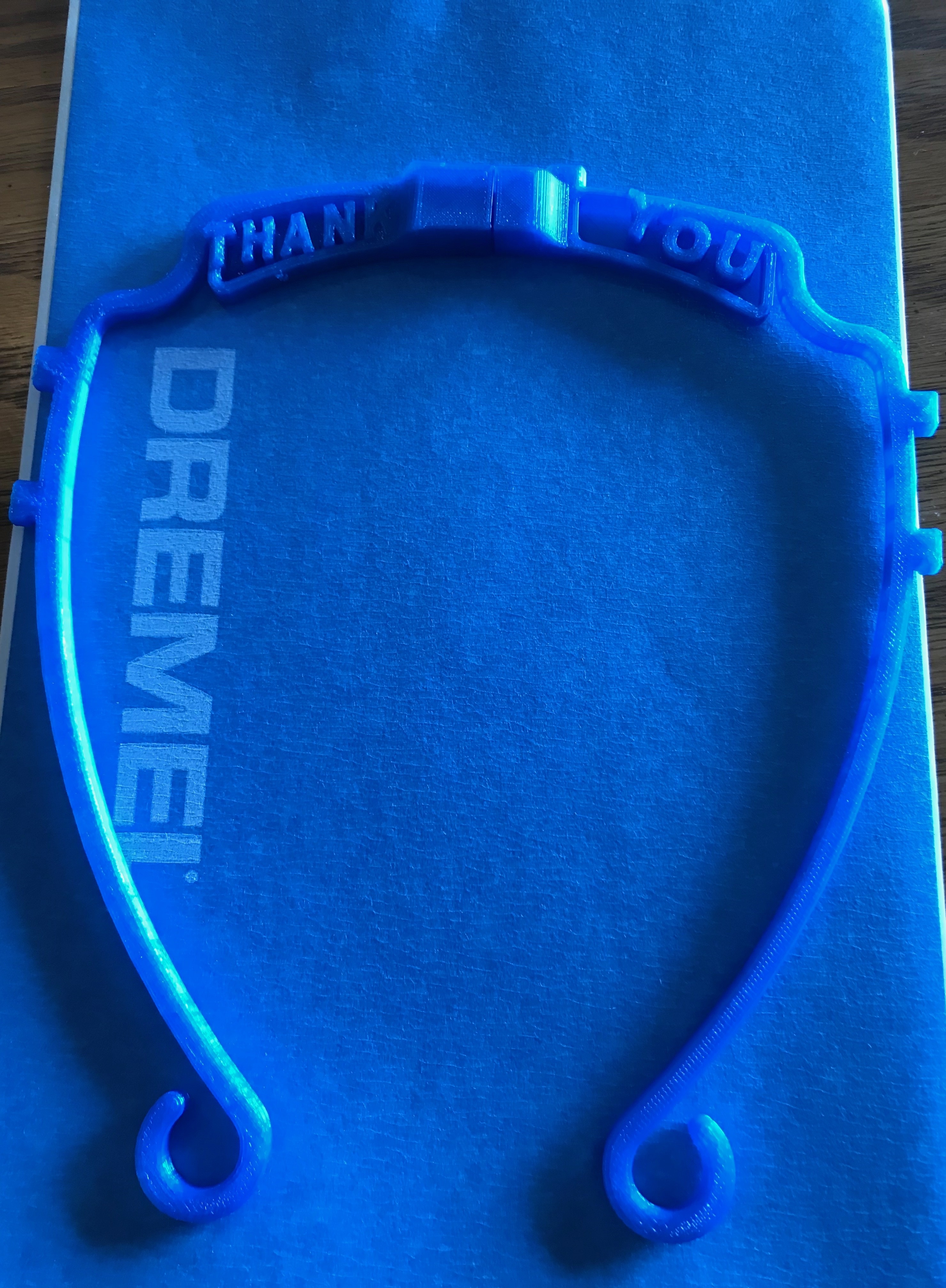 A 3D printed face mask frame with a personalized message