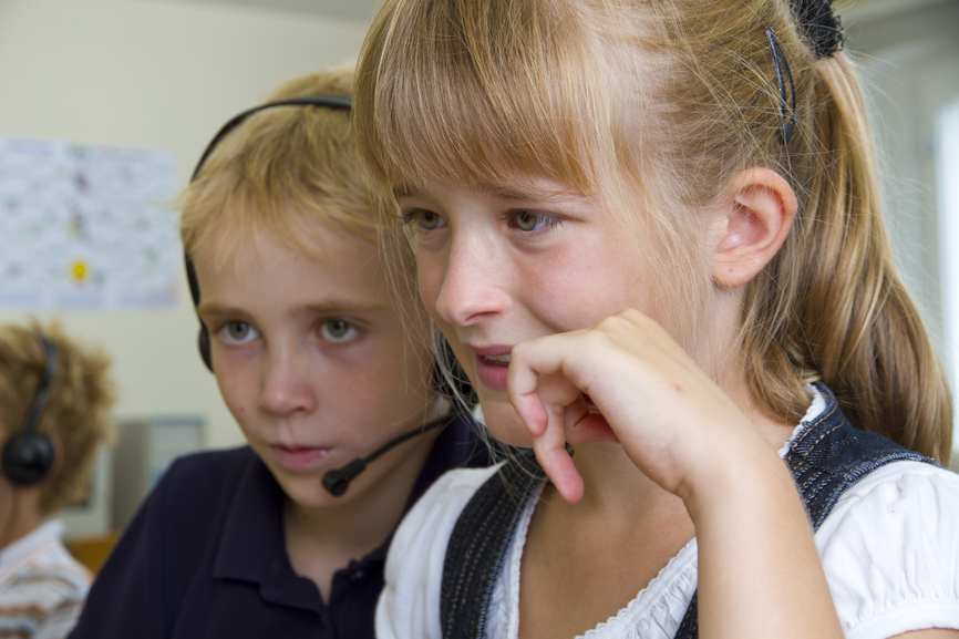 Children using technology to learn