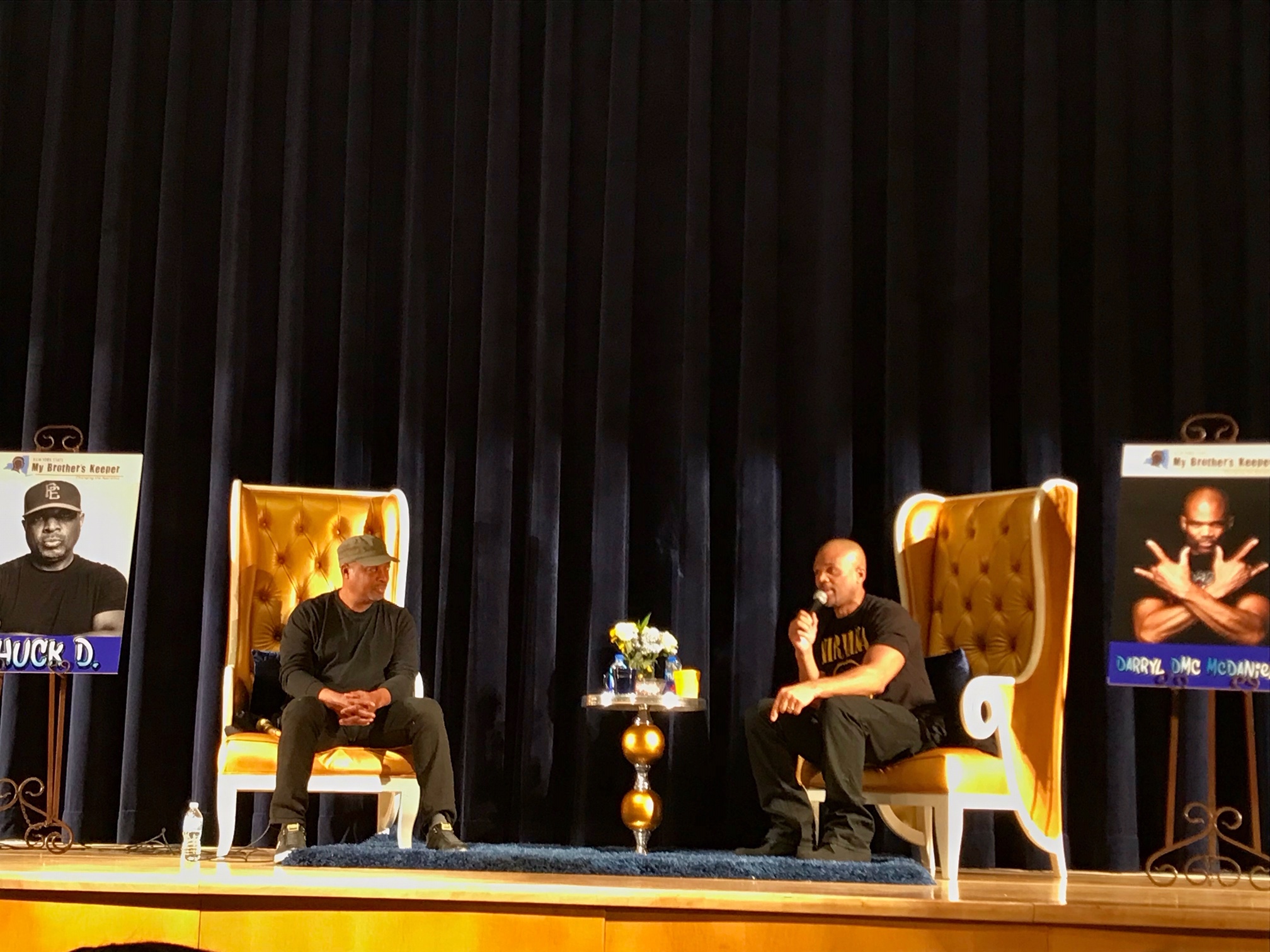   Darryl McDaniels and Chuck D. speaking to MBK students