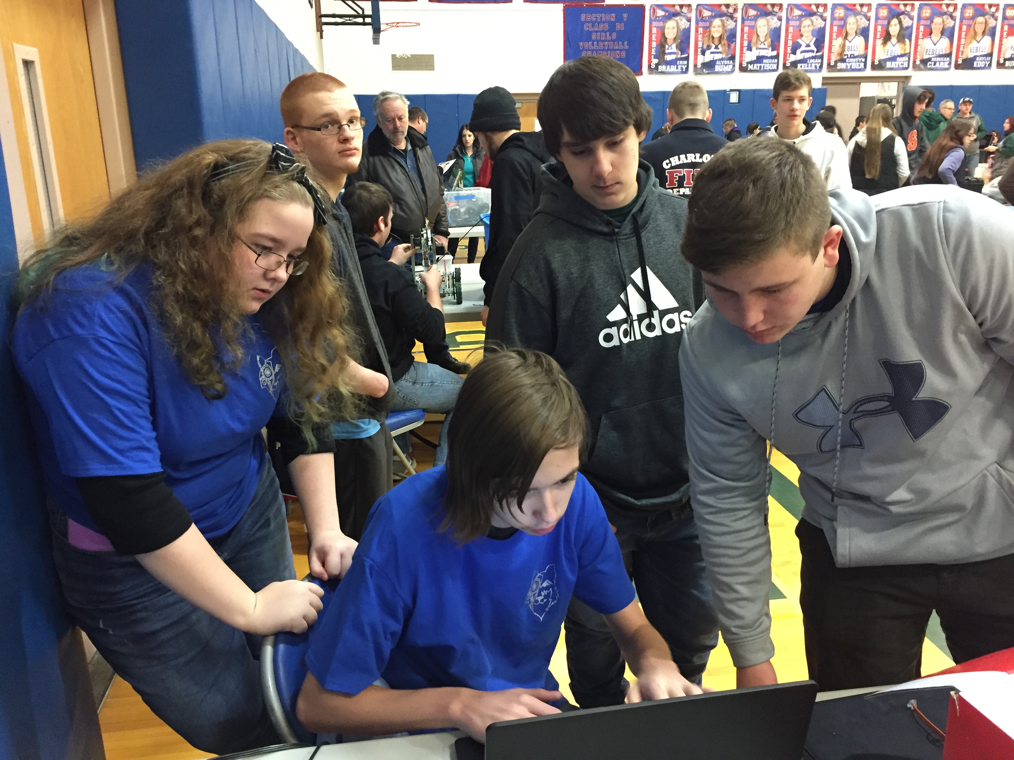 Students using a computer.