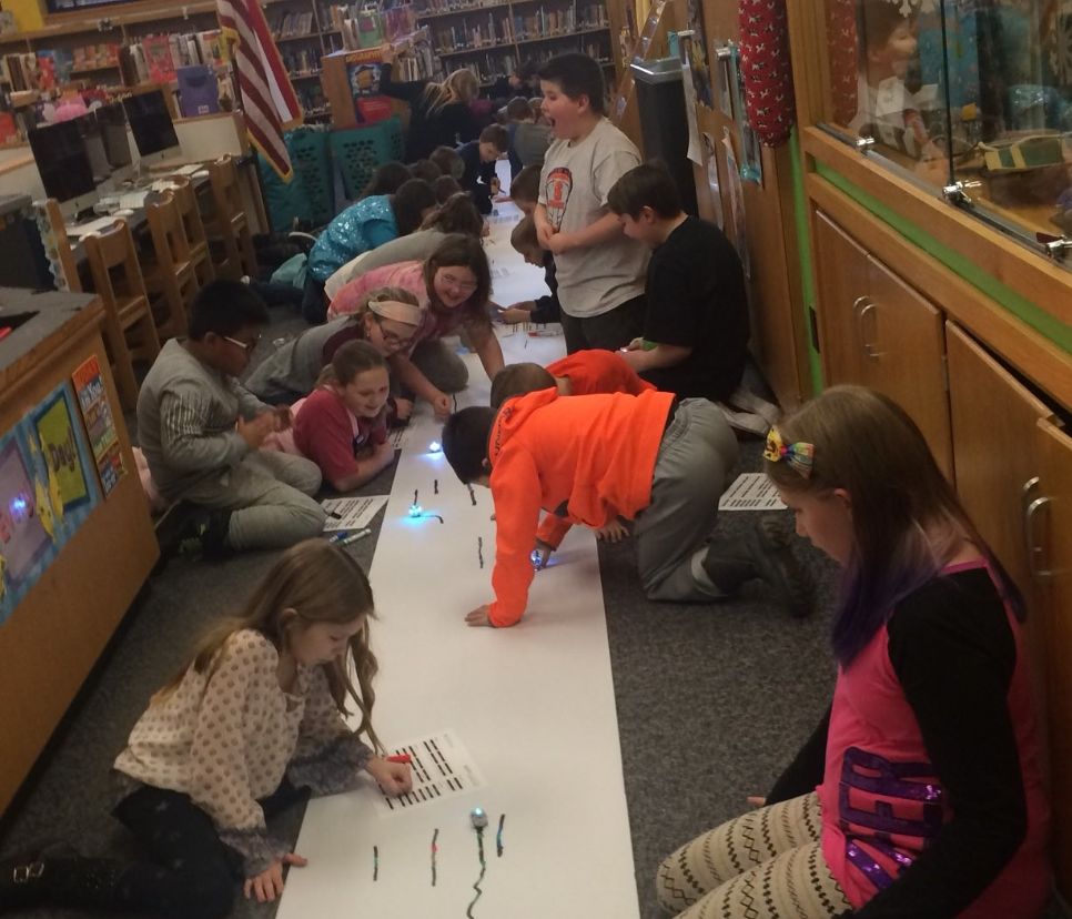 Makerspace Club coding and collaborating with Ozobots