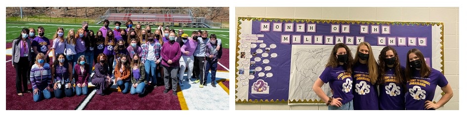 Students celebrating the Month of the Military Child by pinning locations to a map of the world and wearing purple.