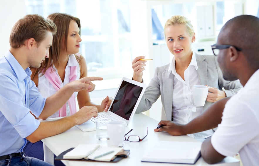 four teachers having a meeting