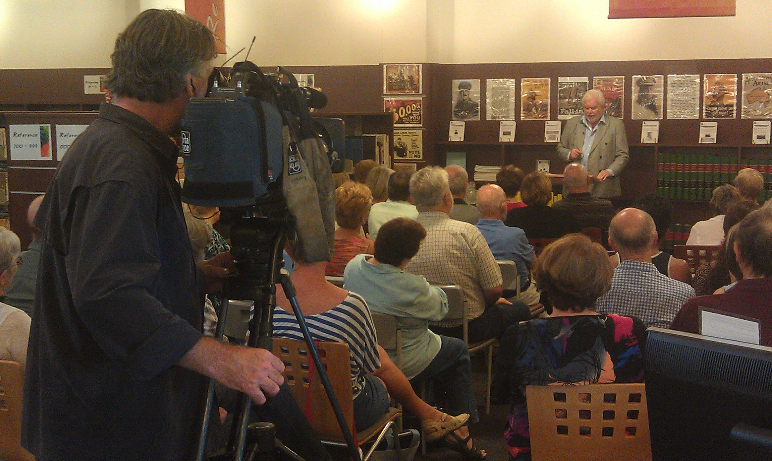 Noel Beddoe reading from his book, "On Cringila Hill" at Kiama Library.