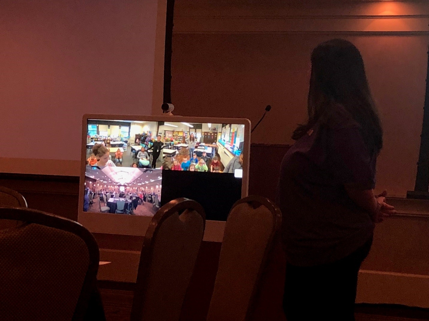 Sheevers connecting with two classrooms at TCSD through video conferencing at the NERIC conference