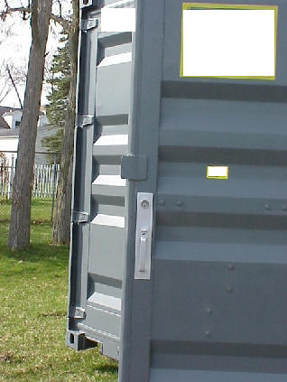Storage container with proper exit door