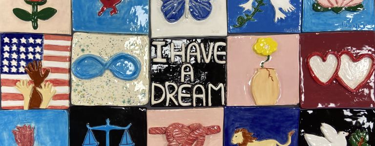 Series of artworks from Glen Cove High School symbolizing MLK's message of peace from