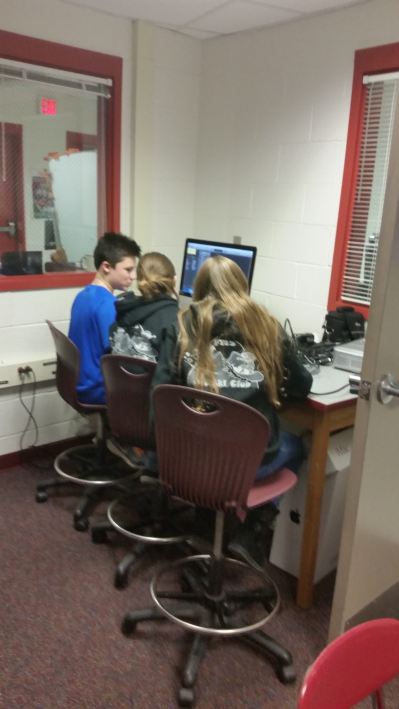 FCAST students working on a project.