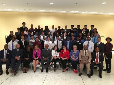 My Brother's Keeper Fellows pose with the Board of Regents, New York State Education Department staff, and Symposium speakers.