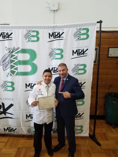 Assemblyman Phil Ramos with a Brentwood MBK student