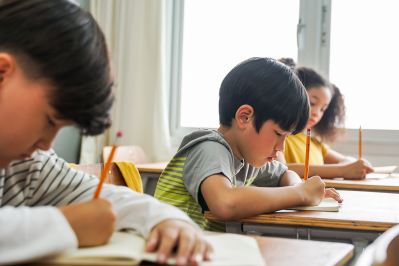 Students in classroom taking test