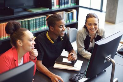 Students working together using a computer