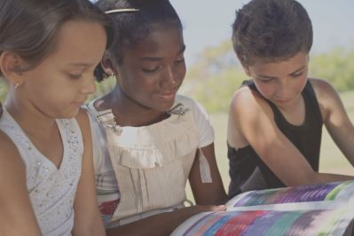 three children reading