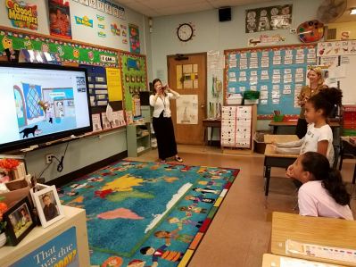 Students watching a television in the classroom