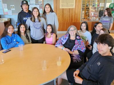 Keynote speaker Dr. Lori Quigley with the Indigenous MBK students from the Onondaga Nation, LaFayette High School
