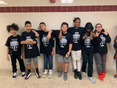 Newark Middle School students participate in the Rites of Passage Celebration
