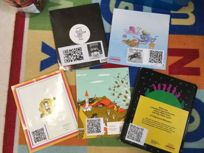 QR Codes taped to back of classroom library books