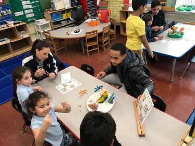 Young students and volunteer tutors at STEAM Night