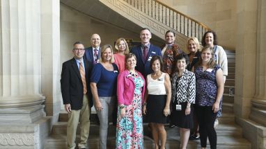 2024 Teacher of the Year with past teachers of the year