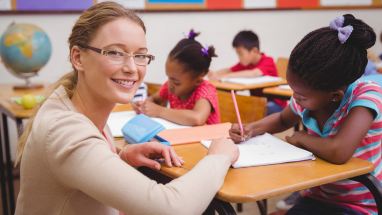 Teacher with students in classroom