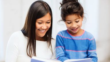 Parent and child reading book