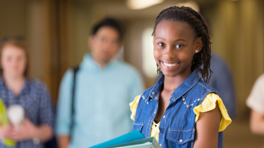 smiling student with backpack