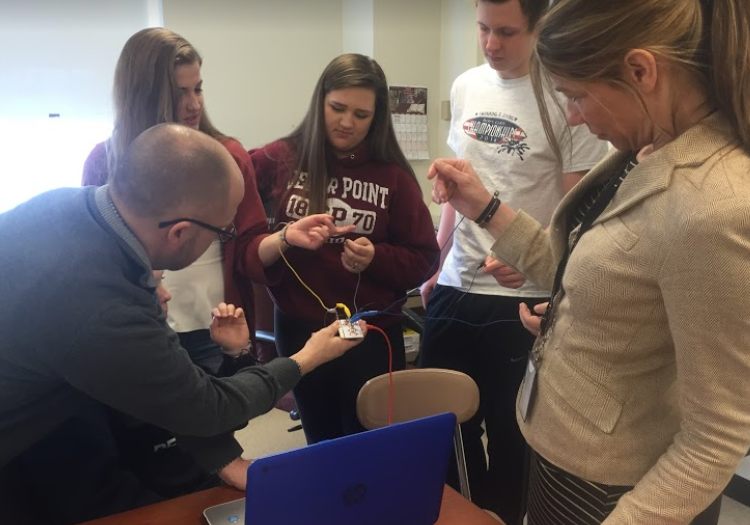 Techsperts learning Makey Makey.