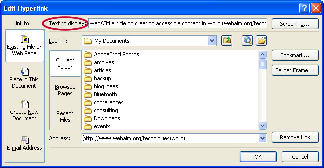 Select a hyperlink, right click, and select Edit Hyperlink or CTRL + k. Change the text in the Text to Display field to a more meaningful description.