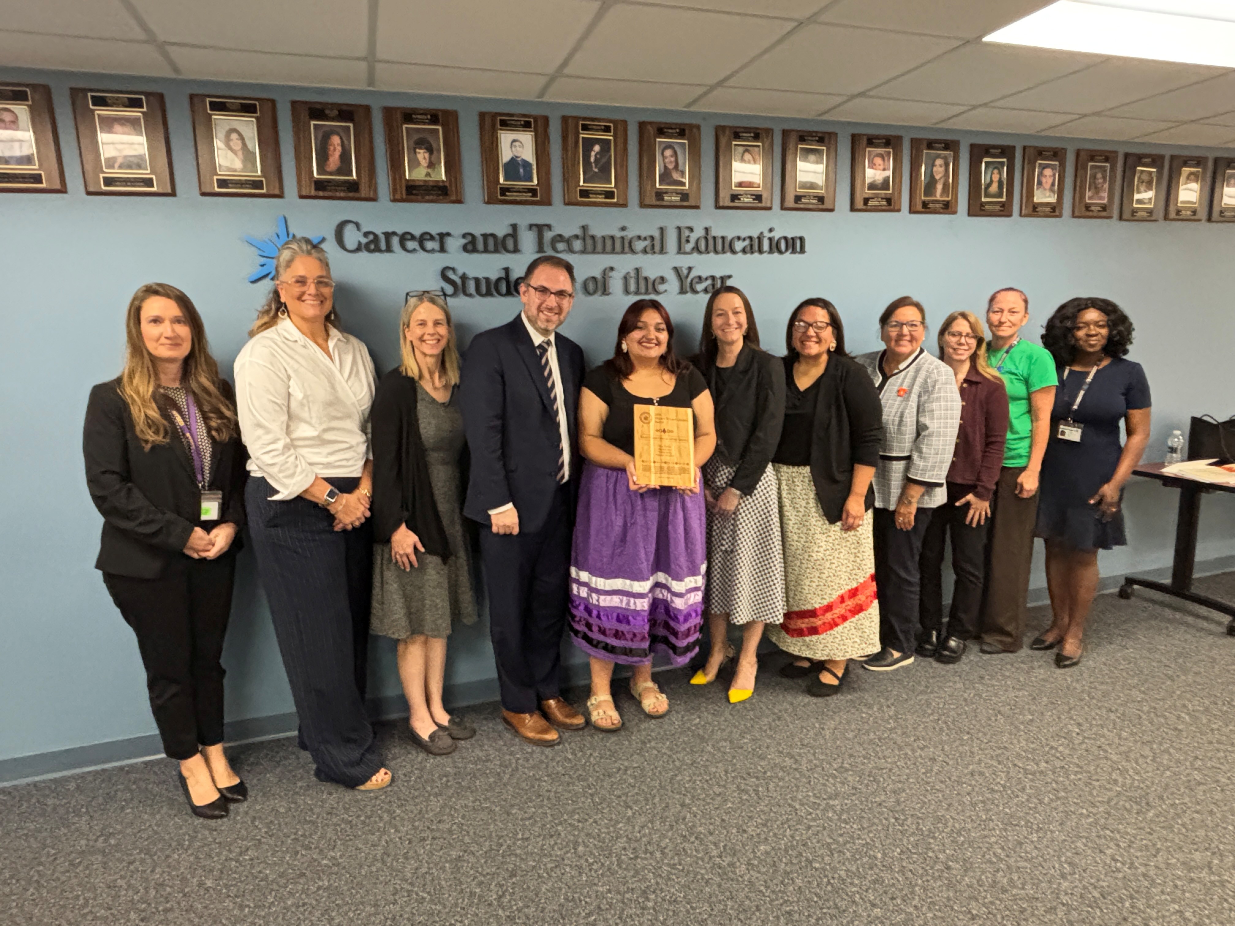 Picture of NYSED staff, members of the Silver Creek Central School District and a graduate of the district, members of the New York State Commission on National and Community Service, and the project consultant.